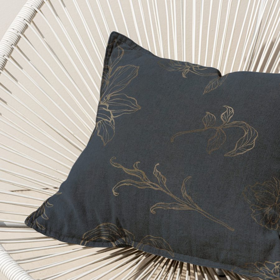 Floral navy printed cushion on a chair minimal interior design