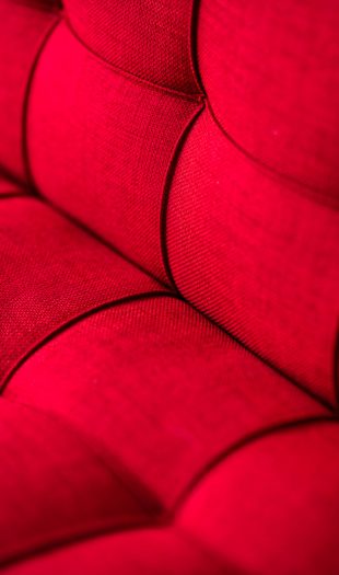 For the comfort you deserve. Stylish red couch sofa. Copy space